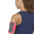 Bracelete Desportiva com Saída para Auriculares Asics MP3 Arm Tube Cor de Rosa